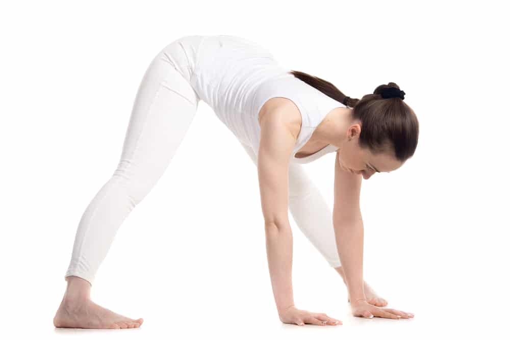 Yoga Near St Pauls - Ludgate Clinic Wide Legged Standing Forward Bend