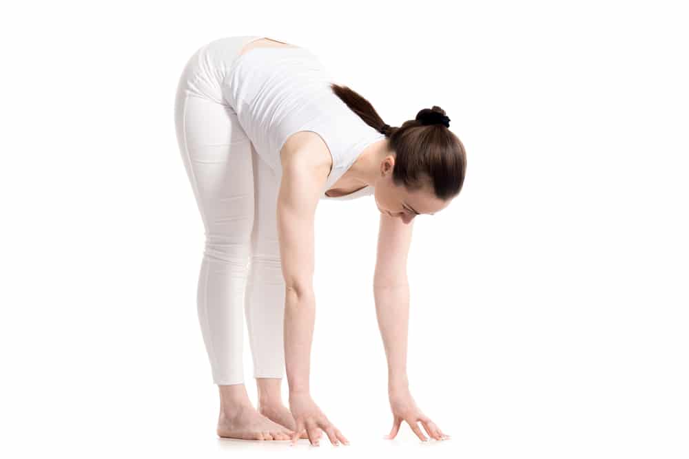 Yoga Near St Pauls - Ludgate Clinic Yoga Pose Standing Forward Bend