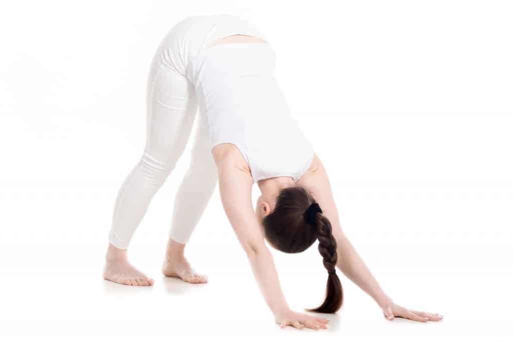 Yoga Near St Pauls - Yoga Pose Downward Dog by Ludgate Clinic