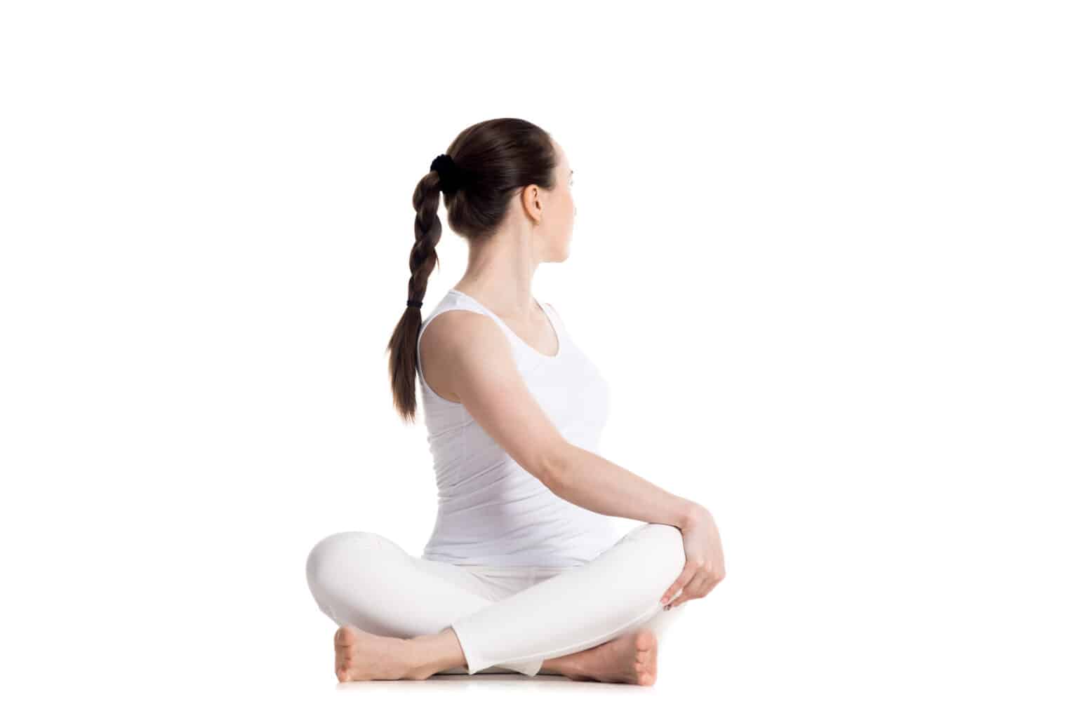 Yoga Near St Pauls - Yoga Pose Seated Torso Twist by Ludgate Clinic